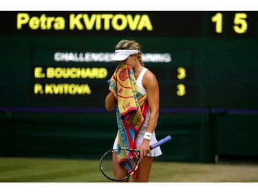 Eugenie Bouchard of Canada stands dejected during the Ladies' Singles final match against Petra Kvitova of Czech Republic on day twelve of the Wimbledon Lawn Tennis Championships at the All England Lawn Tennis and Croquet Club on July 5, 2014 in London, England.
