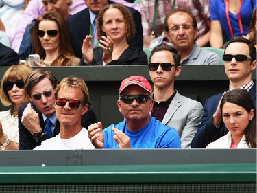 he players box of Eugenie Bouchard of Canada (including Jim Parsons (top right) and Todd Spiewak (2nd r) during the Ladies' Singles final match against Petra Kvitova of Czech Republic on day twelve of the Wimbledon Lawn Tennis Championships at the All England Lawn Tennis and Croquet Club on July 5, 2014 in London, England.