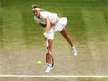 Petra Kvitova of Czech Republic serves during the Ladies' Singles final match against Eugenie Bouchard of Canada on day twelve of the Wimbledon Lawn Tennis Championships at the All England Lawn Tennis and Croquet Club on July 5, 2014 in London, England.