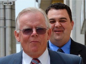 MP Dean Del Mastro, back, and co-accused Richard McCarthy arrive at court following a recess in Peterborough, Ont. on Monday June 23, 2014. THE CANADIAN PRESS/Sean Kilpatrick