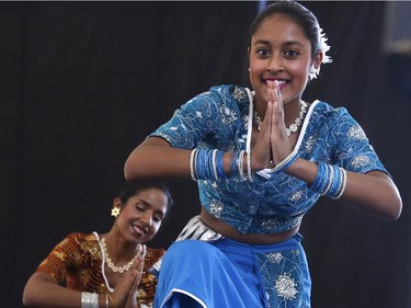 Diliksha Fernando, front, and Manisha Dias of the Ottawa Sri Lankan dance group perform at the Carnival of Cultures at City Hall in Ottawa on Saturday, July 5, 2014.