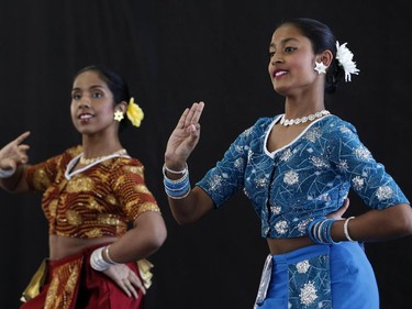 Diliksha Fernando, right, and Manisha Dias of the Ottawa Sri Lankan dance group perform at the Carnival of Cultures at City Hall in Ottawa on Saturday, July 5, 2014.
