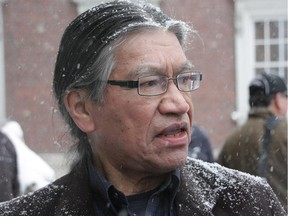 Edmund Metatawabin, 66, a survivor of St. Anne's residential school in Fort Albany, Ont, outside Osgoode Hall in Toronto on Tuesday, December 17, 2013.