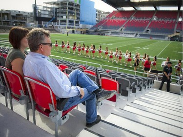 Fans check out their seats during the official opening of TD Place at Lansdowne Wednesday July 9. 2014.