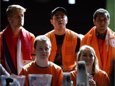 Fans cheering for Netherlands watches the FIFA World Cup 2014 match between Netherlands and Argentina at Hooley's on Wednesday, July 9, 2014.