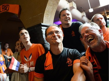 Fans cheering for Netherlands watches the FIFA World Cup 2014 match between Netherlands and Argentina at Hooley's on Wednesday, July 9, 2014.