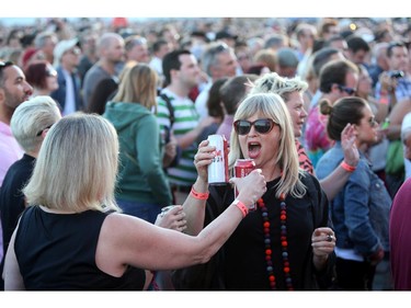 Fans enjoy Blondie as they  perform at Bluesfest Thursday July 10, 2014 at Lebreton Flats in Ottawa.