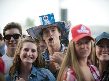 Fans get excited before Tim Hicks hit the stage Sunday July 6, 2014 at Bluesfest held at LeBreton Flats.