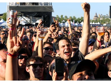 Fans go mad for Slash, who performed Friday night, July 11, 2014 at Bluesfest with Myles Kennedy and the Conspirators.