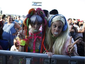Fans like Courtney Constable (left) and Sarah Skaare lined up to be in the front row for the Lady Gaga concert at RBC Ottawa Bluesfest in Ottawa, July 5, 2014.