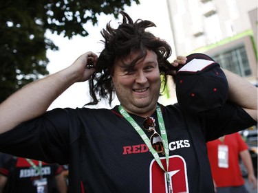 Fans of all categories poured into the stadium grounds before the Redblacks' home opener at TD Place on Friday, July 18, 2014.