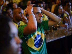 The game against Germany was tough to watch for Brazil's fans, such as Filipe Faleiros, at the Heart and Crown on Tuesday, July 8, 2014, but many recovered and didn't let the devastating defeat dampen the party mood.
