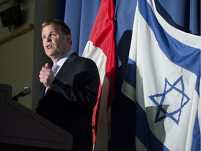 Foreign Affairs Minister John Baird speaks at the Rally for the People of Israel at the Soloway Jewish Community Centre in Ottawa on Wednesday, July 16, 2014.