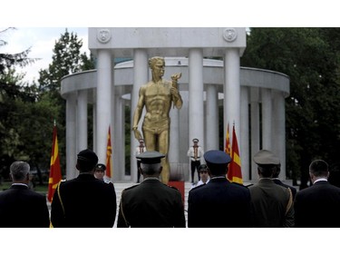 Foreign military representatives attend a commemorative ceremony at the fallen heroes memorial in Skopje, Macedonia, on Sunday, July 27, 2014, to mark the 100th anniversary of the beginning of World War I.