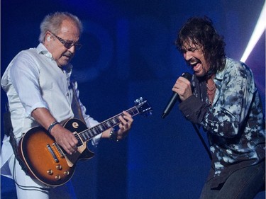 Founder of the band Foreigner, Mick Jones, (L) and singer Kelly Hansen on the Bell Stage at Bluesfest.