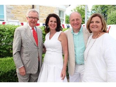 From left, former prime minister Joe Clark, Vicki Heyman, U.S. Ambassador Bruce Heyman, and Maureen McTeer at the annual Independence Day party held at the Heymans' official residence, Lornado, on Friday, July 4, 2014.
