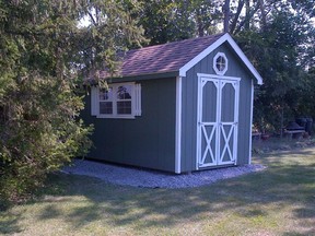 Many homeowners choose to match the design of their garden shed to the look of the house. This one is a Cape Cod style.