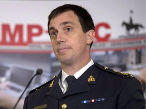 RCMP Assistant Commissioner Gilles Michaud announced 31 charges Thursday.