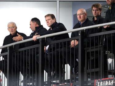 GM Bryan Murray, far left, and other coaches watch the Senators development camp, which had their final 3 on 3 tournament Monday July 7, 2014 at the Bell Sensplex.