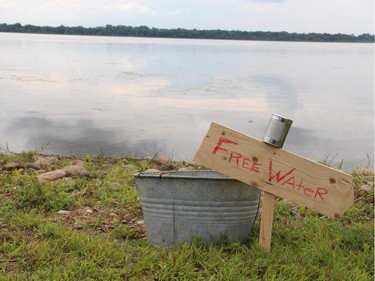 Guests could help themselves to some free water from the Ottawa River at the charity tea party held Sunday, July 20, 2014, for Ryan's Well Foundation.