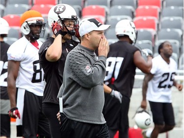 Head Coach Rick Campbell yells out a few instructions mid-practice as the Ottawa Redblacks have their first practice at home since losing their opening season game against Winnipeg.
