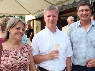 Isabel Ruddick with pilots Mike Ruddick and Joe Cosmano at the Hadfield Youth Summit Soirée hosted by Michael Potter on Monday, June 30, 2014, at his Rockcliffe Park home.