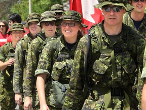 It was a sea of red on Colonel By Drive Friday at 1 p.m. as runners and walkers of all age and ability from the Canadian Armed Forces, DND and other non-government groups participated in the Canadian Forces Day Walk/Run in Red 2014.