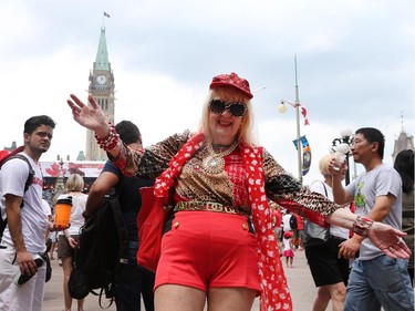 Joan Sapone shows off her fashion sense as people flock to Parliament Hill and the downtown core to enjoy Canada's 147th birthday. Photo taken at 12:56 on July 1, 2014.