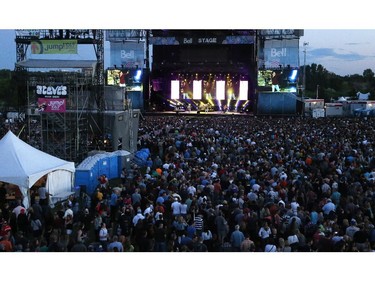 Journey plays on the main stage to appreciative audience on day two of Bluesfest Friday, July 4, 2014 at LeBreton Flats, Ottawa.