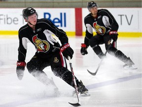 Kelly Summer (L) with Cody Ceci (R) during drills as the Ottawa Senators continue to hold their development camp. Photo taken at 09:35 on July 2, 2014. (Photo by Wayne Cuddington / Ottawa Citizen)