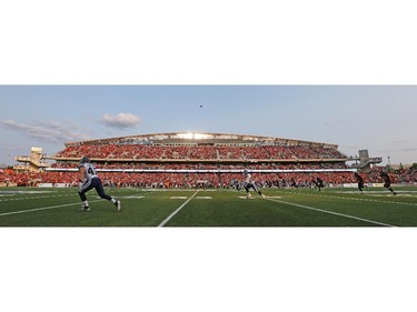 Kickoff of the franchise home opener of the Ottawa Redblacks against the Toronto Argonauts at TD Place on Friday, July 18, 2014.