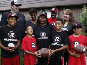 Three generations of Blackwoods will be at the Redblacks' home opener on Friday night. In the back row, from left, are James Flindall, Karen Flindall, Gemma Blackwood, David Blackwood and Kathy Blackwood. In front, are Justin Flindall, Jalen Flindall, Devaughn Blackwood and Deion Blackwood.