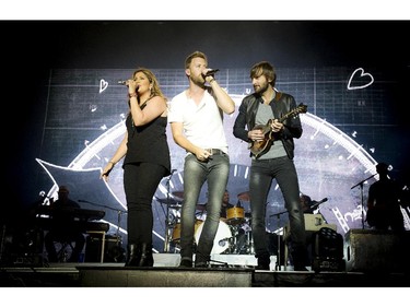 L-R  Hillary Scott, Charles Kelley and Dave Haywood of Lady Antebellum performed on the Bell Stage Sunday July 6, 2014 at Bluesfest held at LeBreton Flats.
