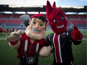 Redblacks mascot Big Joe and The Fury FC's Sparky at TD Place Stadium at Lansdowne Park.