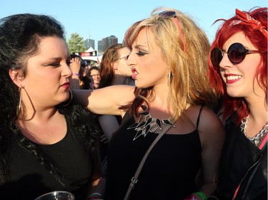 Ladies wait for Lady Gaga, who performed on the main stage Saturday, July 5, day three of Bluesfest at LeBreton Flats.