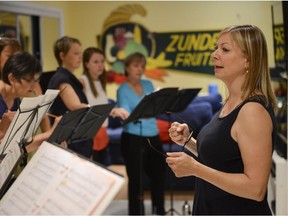 Lee Hayes conducts choir practice in advance of their performance with Procol Harum at  Bluesfest Thursday.