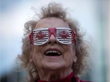 Lil Wrigglesworth wears patriotic glasses bearing Canadian flags during Canada Day celebrations in Vancouver, B.C., on Tuesday July 1, 2014.