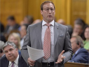 Justice Minister Peter MacKay answers a question during Question Period in the House of Commons on Parliament Hill in Ottawa, Wednesday, June 18, 2014
