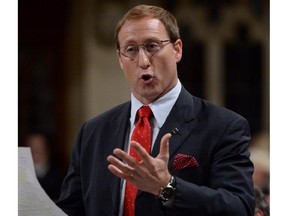 Minister of Justice Peter MacKay stands during question period in the House of Commons on Parliament Hill on in Ottawa on Thursday, June 19, 2014.