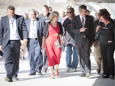 Mayor Jim Watson, city councillors and other dignitaries arrive at the official opening of TD Place at Lansdowne Wednesday July 9. 2014.