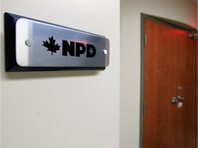 A simple sign marks the NDP satellite office inside an office building in Montreal.