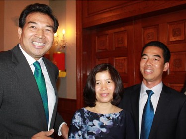 Newly minted Chinese ambassador Luo Zhaohui hosted a reception at the embassy June 17, on the occasion of assuming his post. He is shown with Vietnamese Ambassador Anh Dung To and his wife, Phi Nga Tran.