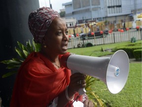 Nigerian campaigner Maryam Uwais presses for the release of the abducted Chibok schoolgirls during a rally to mark 100 days since 276 girls were abducted from their school in Chibok, Borno State, on July 23, 2014.  Relatives scarred by Boko Haram's mass abduction of Nigerian schoolgirls recounted their nightmare to President Goodluck Jonathan on Tuesday, during their first meeting with Nigeria's leader 100 days after the shocking attack.