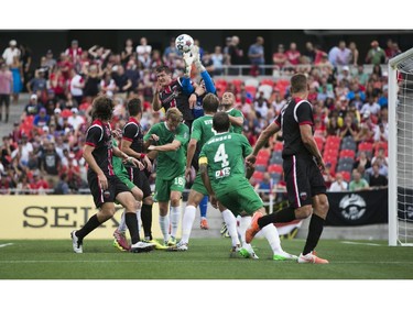 Ottawa Fury FC attempt a corner kick against the New York Cosmos during their NASL soccer match-up at TD Place in Ottawa, July 20, 2014.