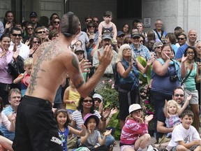 Australian street-performer, Al Millar (or Alakazam) wowed the Sparks Street crowds at Buskerfest Saturday with his hilarious and death-defying half-hour show. Buskerfest is running through Monday with hundreds of acts performing on the pedestrian mall between 9:00 a.m. and 11:00 p.m. daily.