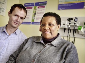 Nurse practitioner Chris Bradley (left) with Spes Ndongozi  at the Pinecrest Queensway Community Health Centre.