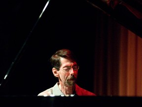 Jazz Pianist Fred Hersch performs during the Ottawa Jazz Festival in the auditorium of the Library and Archives Canada on July 3, 2010.               Photo by David Gonczol/The Ottawa Citizen)