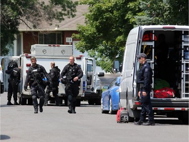 The Ottawa police tactical squad executed a search warrant at a home located at 19 Topley Crescent in the Hunt Club area on Friday, July 18, 2014.