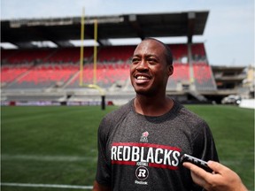 Ottawa Redblacks QB Henry Burris speaks with media at TD Place Stadium, the day after their Home Opener and first franchise win on Saturday, July 19, 2014. (Cole Burston/Ottawa Citizen)