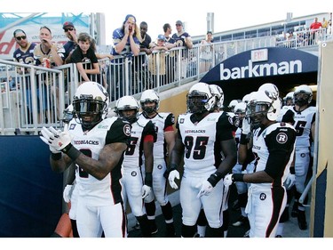 Jovon Johnson #2 of the Ottawa RedBlacks prepares to make his way on to the field in first half action in a CFL game against the Winnipeg Blue Bombers at Investors Group Field on July 3, 2014 in Winnipeg, Manitoba, Canada.